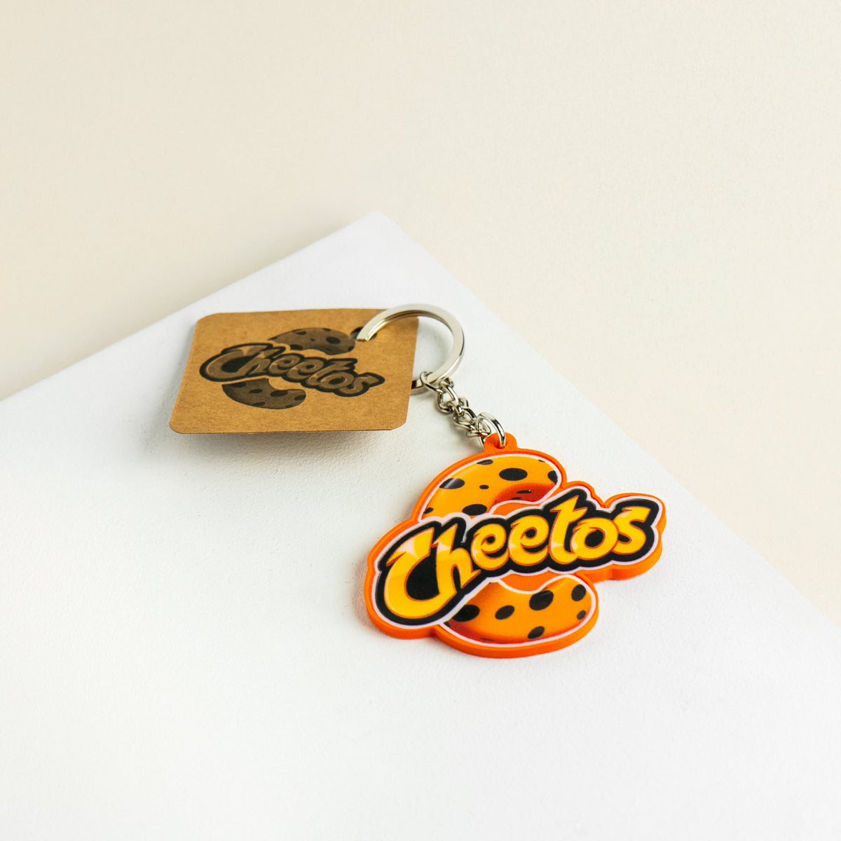 Llavero publicitario personalizado de Cheetos, fabricado en impresión 3D, con relieves definidos, alta fidelidad de color y acabado premium